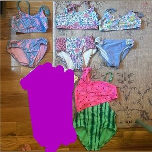 4 separate girls swimsuits all size 6